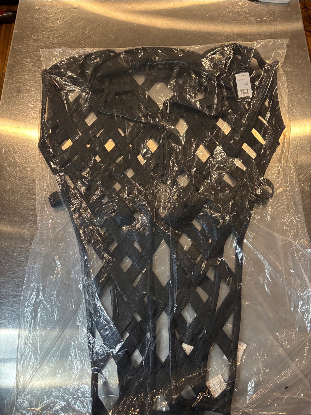 AKIRA Cage Faux Leather Statement Piece